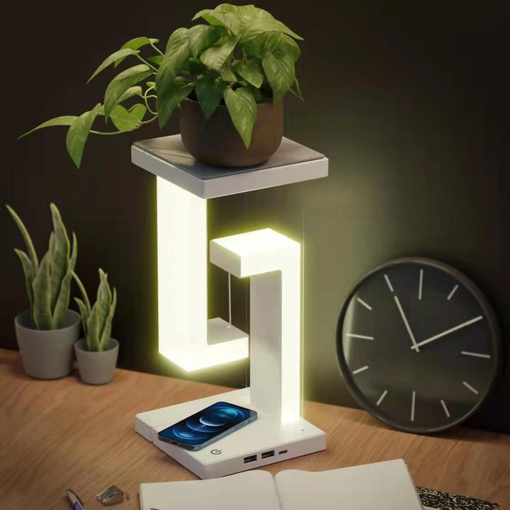 Tischlampe mit kabelloser Ladestation für Smartphone