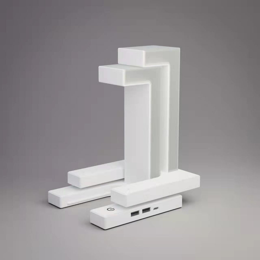 Tischlampe mit kabelloser Ladestation für Smartphone