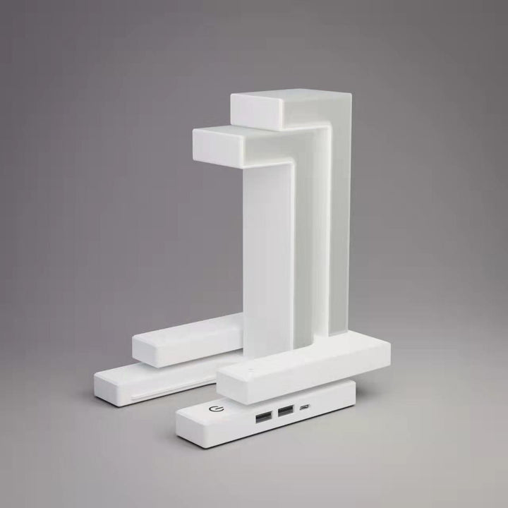 Tischlampe mit kabelloser Ladestation für Smartphone