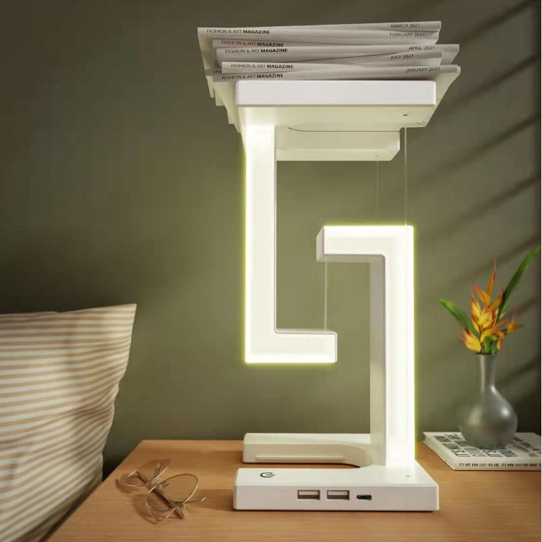 Tischlampe mit kabelloser Ladestation für Smartphone
