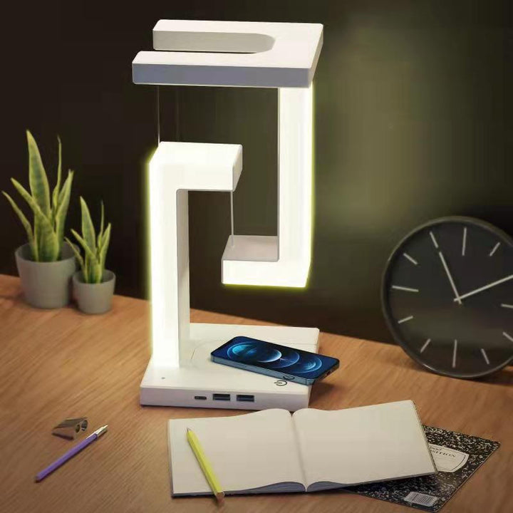 Tischlampe mit kabelloser Ladestation für Smartphone